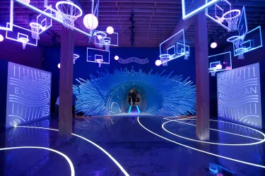Neon basketball court at the American Express Basketball Deconstructed experience