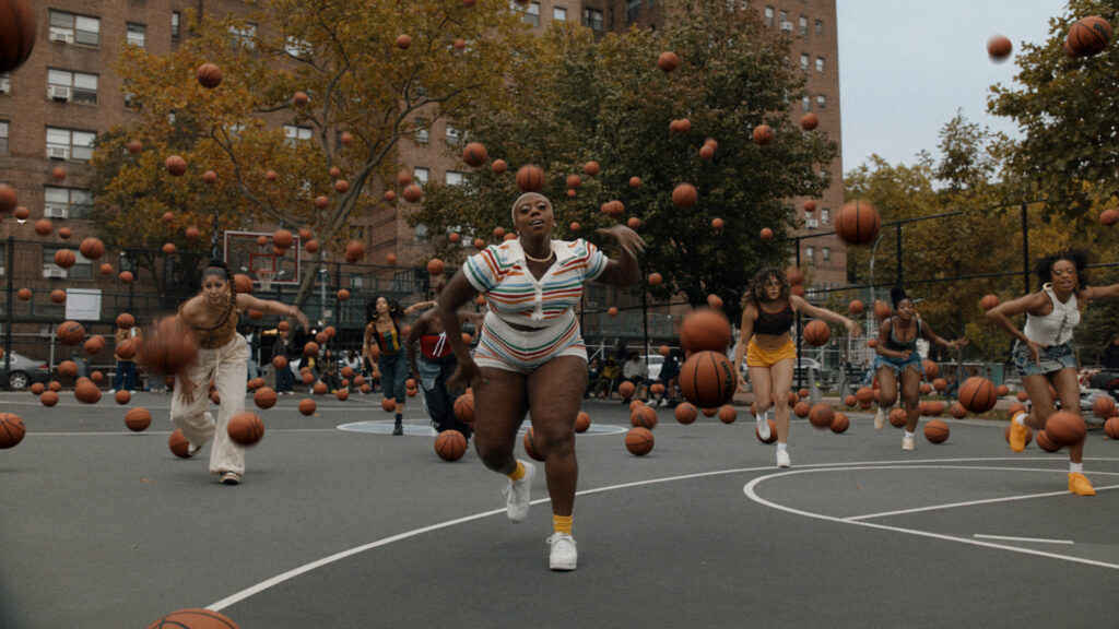 Dancers and basketball players flood a New York City court in DoorDash’s Basketball 2.0 music video